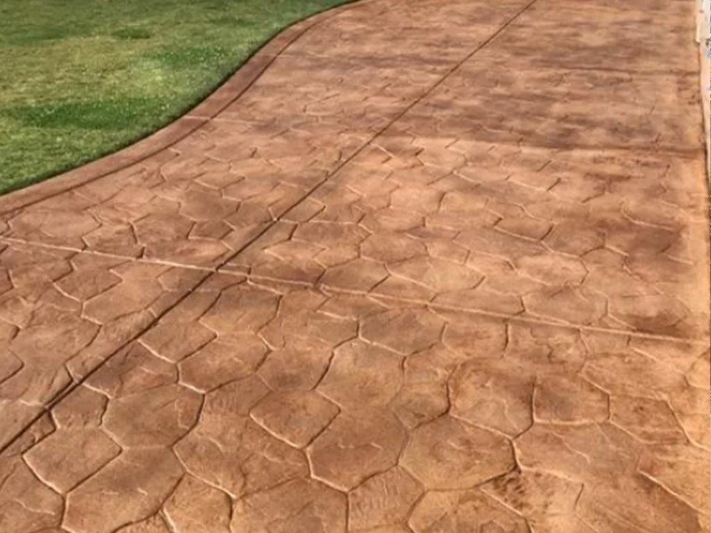 Cleaned and sealed stained concrete driveway